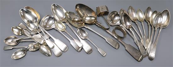 A quantity of mixed mainly fiddle pattern silver flatware and two silver napkin rings, 41 oz.